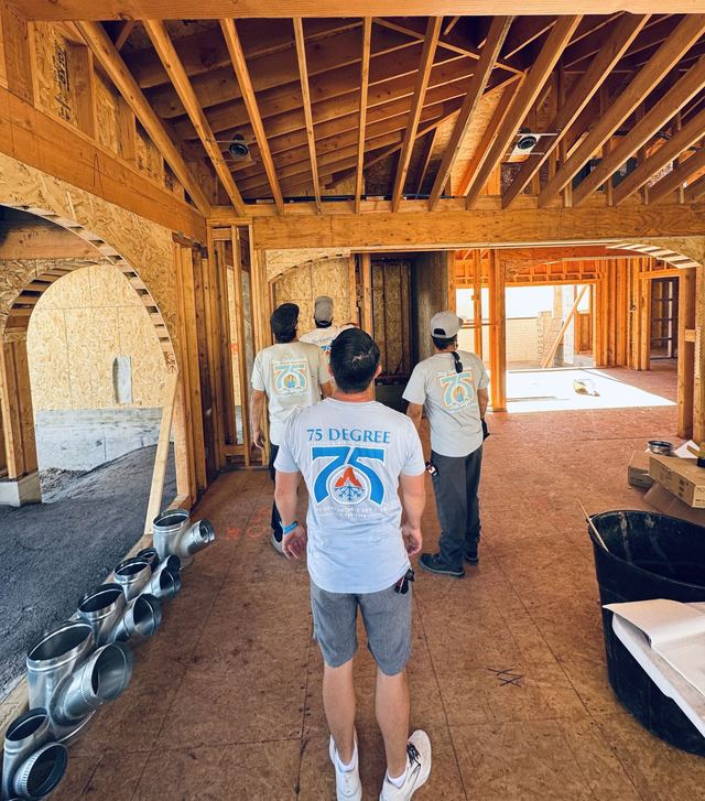75 Degree crew walking through a new-construction home