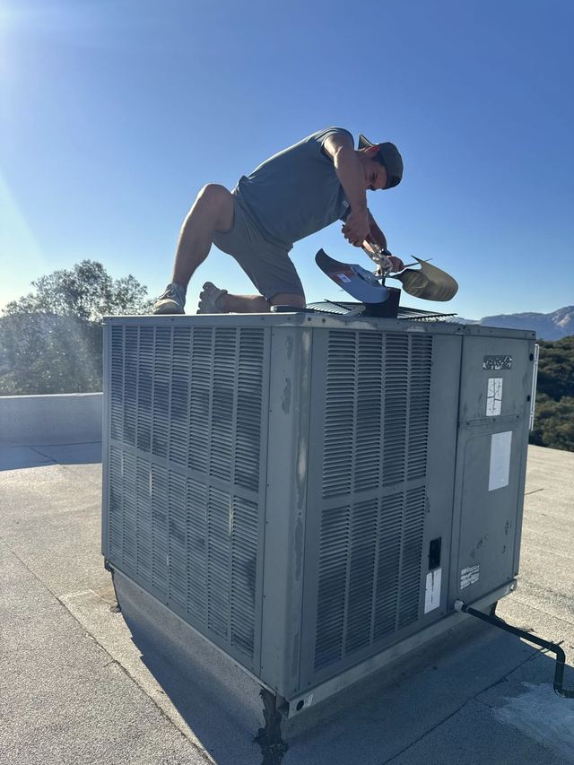 Repairing a rooftop unit condenser fan
