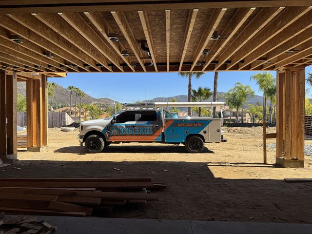 75 Degree service truck seen through new-construction framing