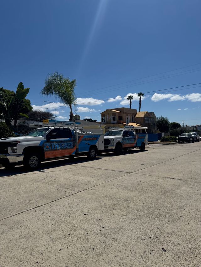75 Degree service trucks under palm trees